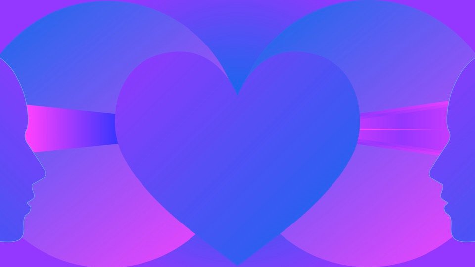 Transpersonal Image 16: A large blue heart fills the space between two facing head profiles and pink beams.